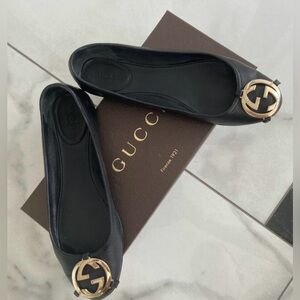 Gucci Black Flats with Gold Emblem